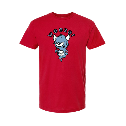 Red short-sleeved t-shirt featuring a cartoon blue monster with horns and one eye, holding a circular ’w’ logo beneath the word “weezer” in black lettering.