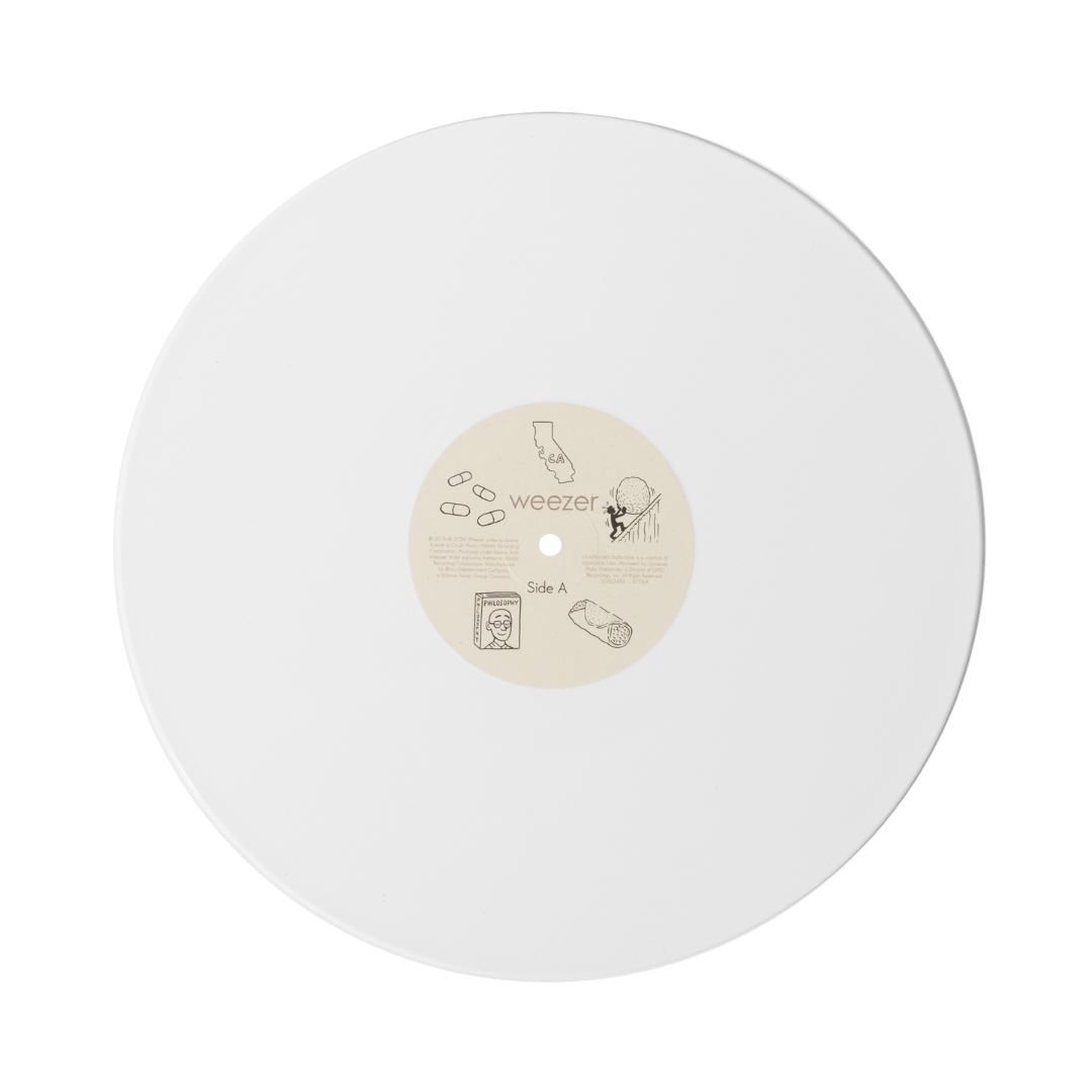 White translucent vinyl record with a beige center label featuring minimalist line art and the band name ’weezer’ printed in lowercase.
