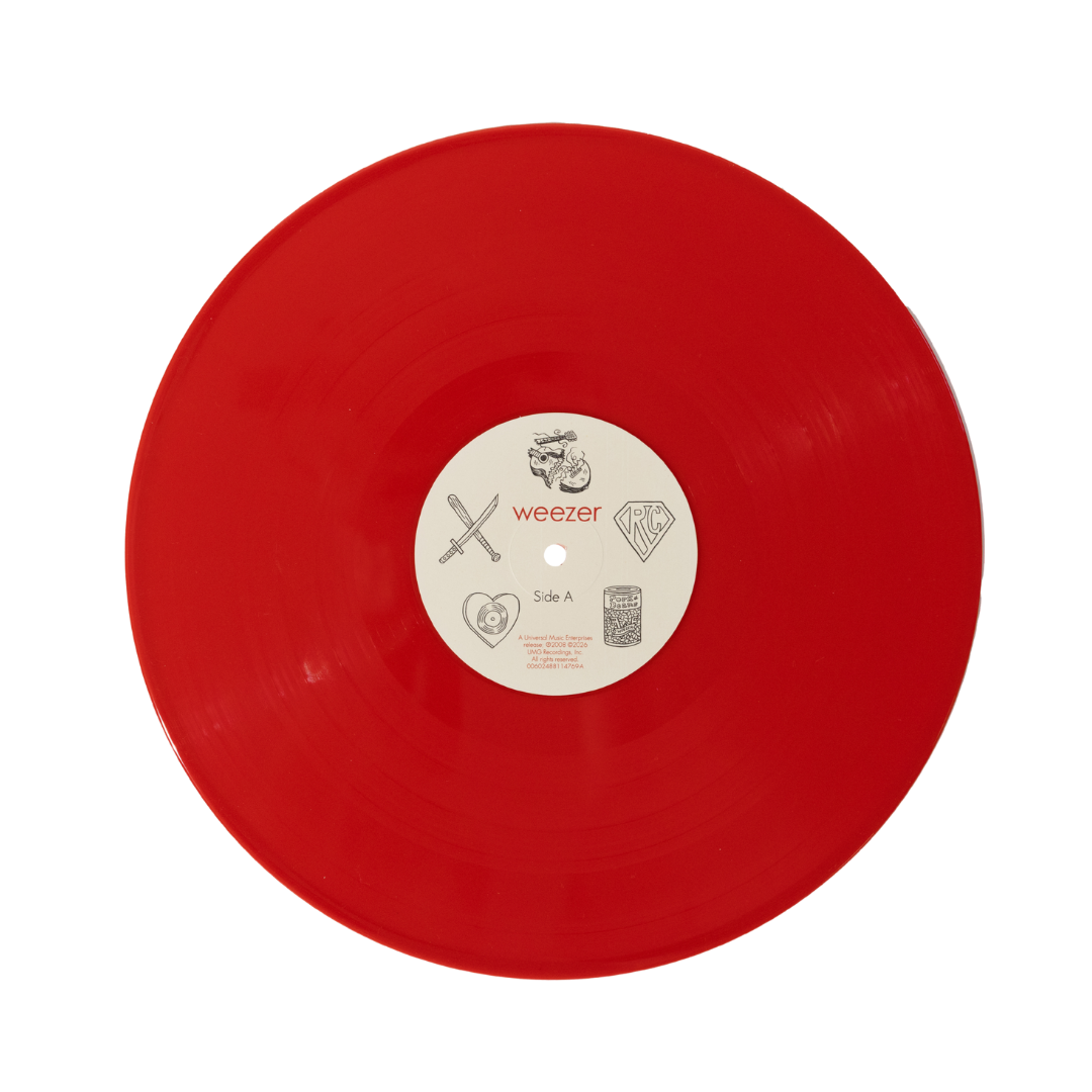 Vibrant red vinyl record with a white center label featuring the band weezer’s logo and iconic symbols.