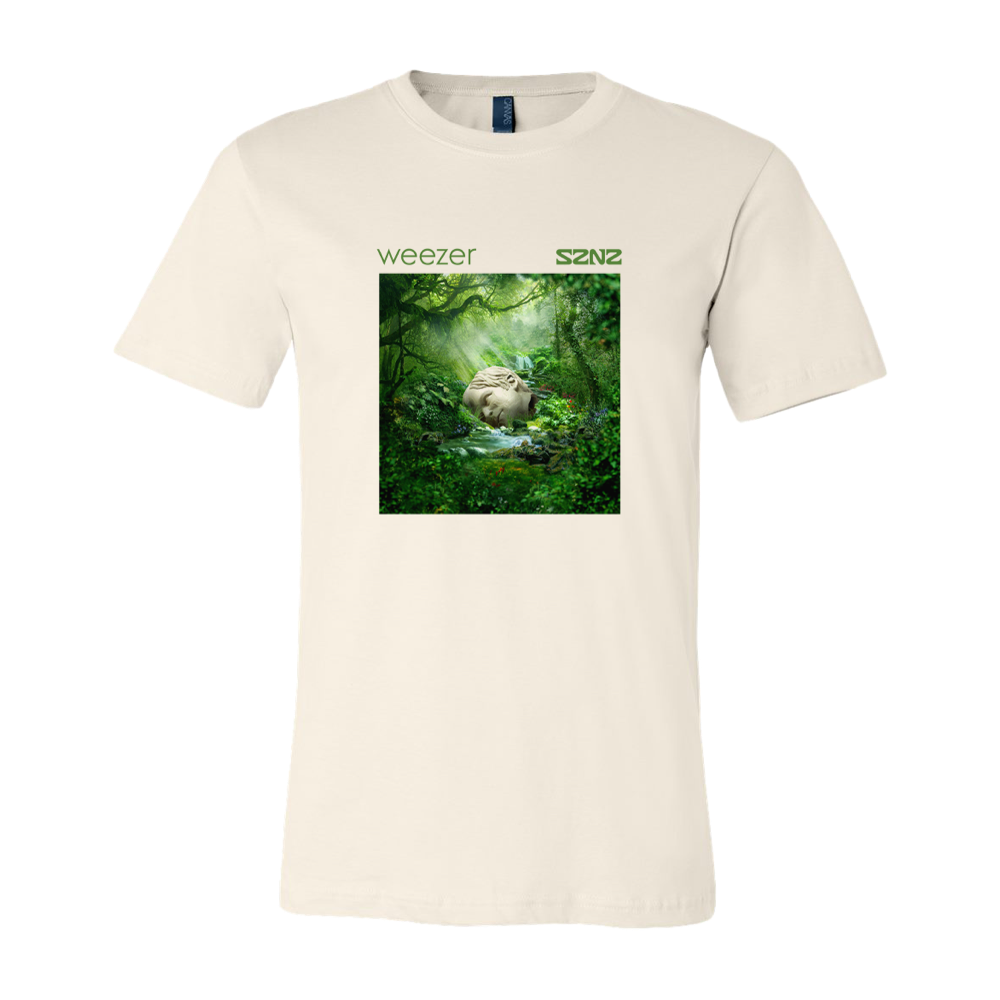 Cream-colored t-shirt featuring a Weezer album cover image of a lush green forest scene.