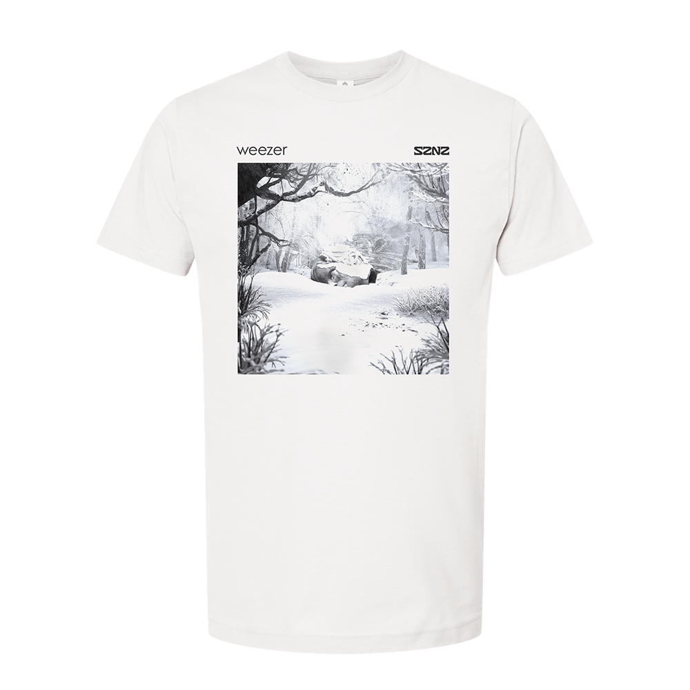 White t-shirt featuring a black and white winter scene graphic and the text ’weezer’ and ’SZNZ’.